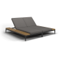 Outdoor sun lounger with side table